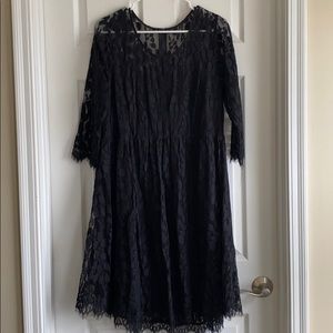 Lacy black dress with black underlay